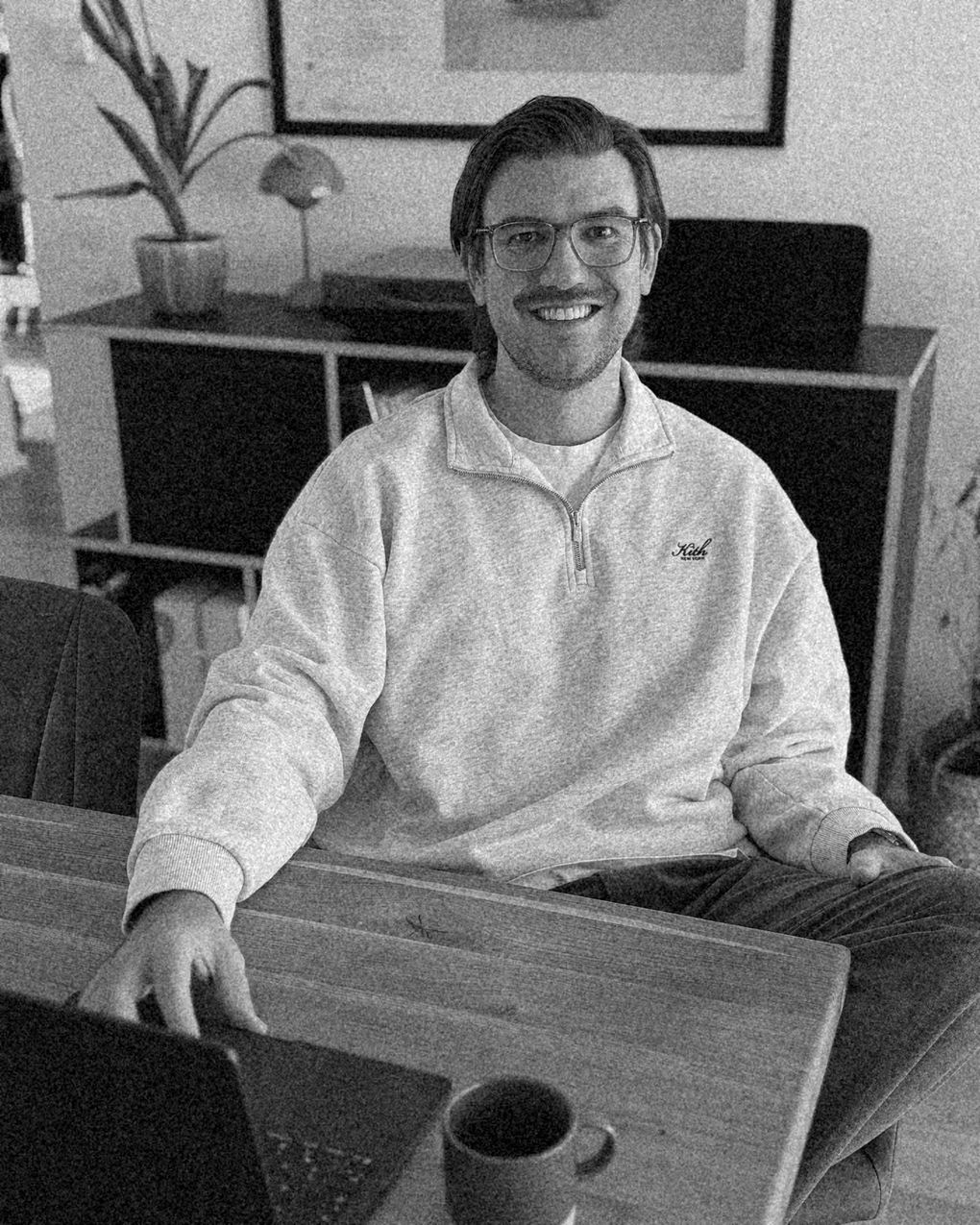 Chris, founder of Builders Kollektiv, at his laptop